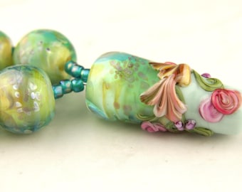 Lampwork Glass Bead Set. Iridescent Green with Flowers