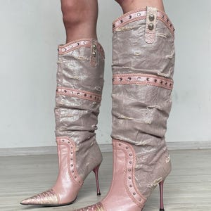 El Dante’s vintage distressed high heel boots