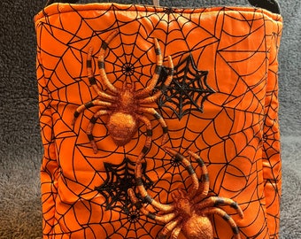 Orange spider web treat bag