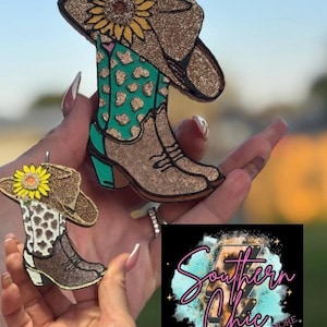 Cowgirlstiefel mit einem Sonnenblumenmotiv