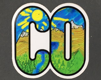 May include: A sticker featuring the letters "CO" with a landscape design. The left side depicts a yellow sun and blue sky over a mountain, while the right side shows a river, trees, and mountains.