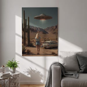 May include: A canvas print depicting a desert scene with a woman standing before a vintage car. Above, a UFO hovers, emitting a bright light. Tall cacti and mountains fill the background, under a clear sky. The artwork evokes a sense of mystery and science fiction.