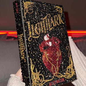 Handmade Bedazzled Rhinestone Lightlark book by Alex Aster