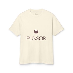 May include: A cream colored t-shirt with a brown logo that says "PUNSOR" with a small graphic of a roof above the word.