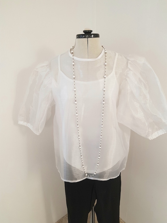 glossy white blouse, 1980s does victorian, steampu