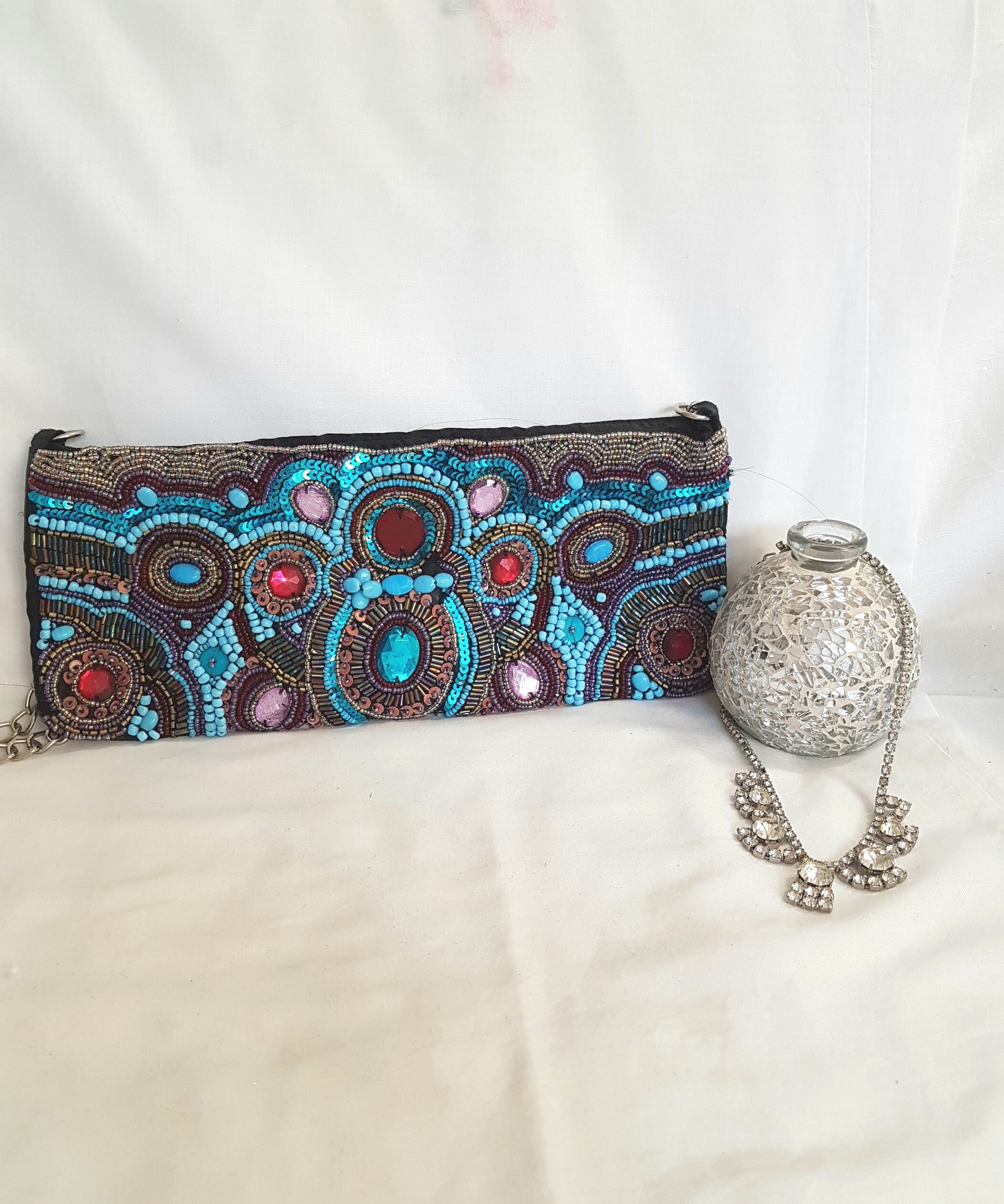 blue beaded clutch