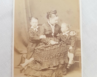 Antique victorian photograph, elaborate costumes, mother and sons, old postcards