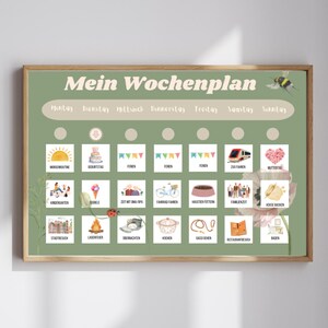 May include: A green weekly planner with a wooden frame. The planner has a title that says "Mein Wochenplan" and has days of the week listed across the top. Each day has a grid of images representing activities.