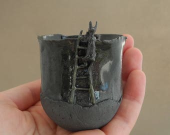 Cup in dark green porcelain with a rabbit on a ladder - handmade ceramic whimsical vessel