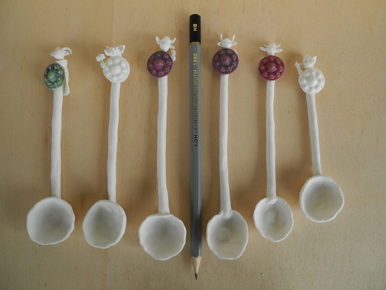 in white porcelain Viking warrior spoon sugar scoop