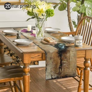May include: A wooden dining table set with a floral table runner, white plates, and a vase of flowers. The table is set for a meal, with a candle and a small jar labeled "HOME". The text "2D flat printing" is visible.