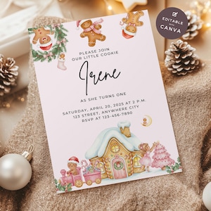 May include: A pink invitation card with Christmas-themed illustrations, including gingerbread men, a gingerbread house, and a train. The text reads "Please join our little cookie Irene as she turns one."