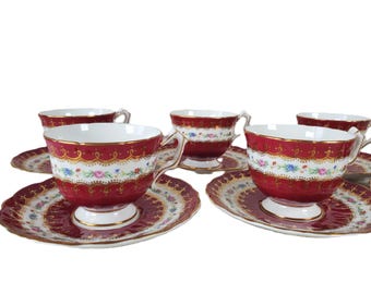 Aynsley tekopp och fat, set om 6, rubinrött och guldfärgat filigranbenporslin, engelskt High Tea-set, 1930-1950-tal Mönster 2419