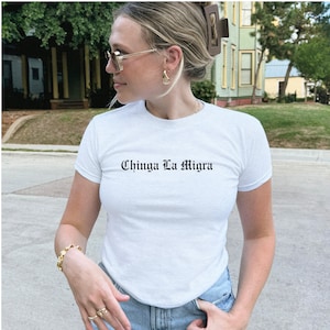 Chinga la Migra women&#39;s baby tee Mexican pride shirt Spanish text embroidered Baby tee F ICE resistance clothing for women and girls