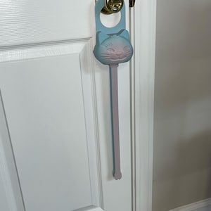 A cotton candy Sidewinder smart cat toy.