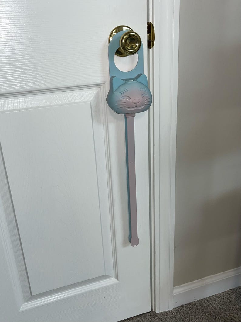A cotton candy Sidewinder smart cat toy.