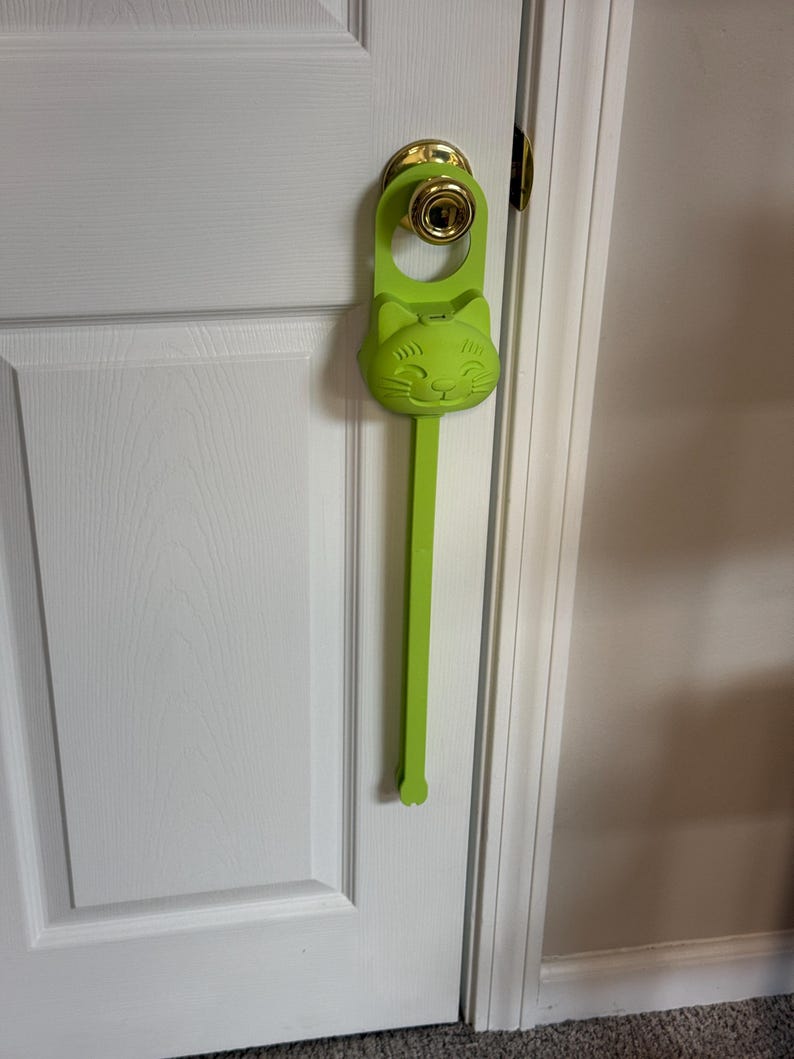 A brat green Sidewinder smart cat toy.