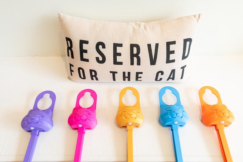 Various colors of the Sidewinder smart cat toy.