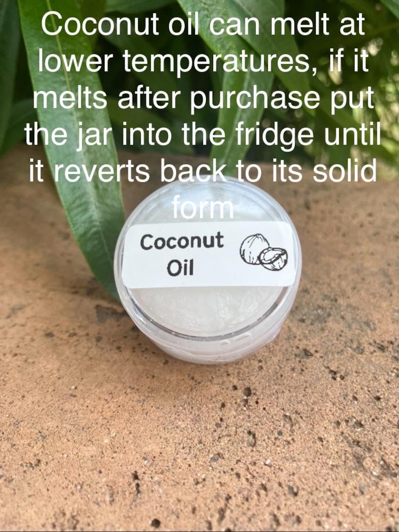 May include: A small, clear, round plastic jar containing white coconut oil. The label features the text 'Coconut Oil' and a small line drawing of a coconut. The text on the image reads: 'Coconut oil can melt at lower temperatures, if it melts after purchase put the jar into the fridge until it reverts back to its solid form'.