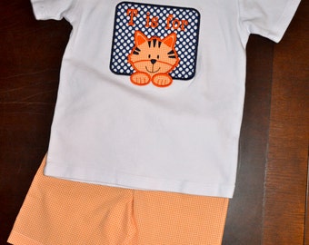 Boys gingham shorts with applique top.