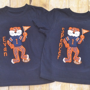 Tiger appliqué shirt.