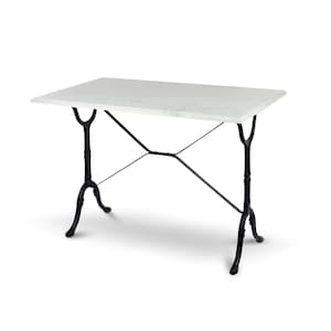 May include: A white marble top table with a black metal base. The table has a simple, rectangular design with a cross-shaped support structure.