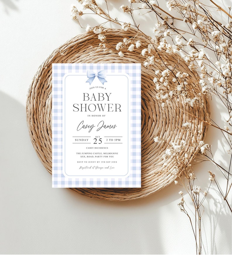 May include: A blue and white gingham baby shower invitation with a blue bow. The invitation reads "Join us for a Baby Shower in honor of Casey James. Sunday, October 25, 2 to 5 pm. Casey Residence. The Jumping Castle, Melbourne, XXX, Road, Party for you. RSVP to Jenny by 5th Sep 20XX.  Regarded it Droge and Love."