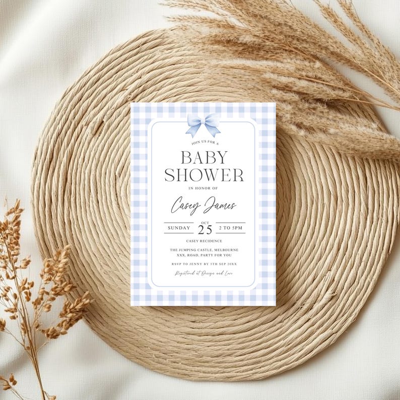 May include: A blue and white gingham baby shower invitation with a blue bow. The invitation reads "Join us for a Baby Shower in honor of Casey James, Sunday, Oct 25, 2 to 5pm, Carey Residence, The Jumping Castle Melbourne, xxx Road, Party for you. RSVP to Jenny by Sep 15th. Designed and Designed and Created by Jenn."