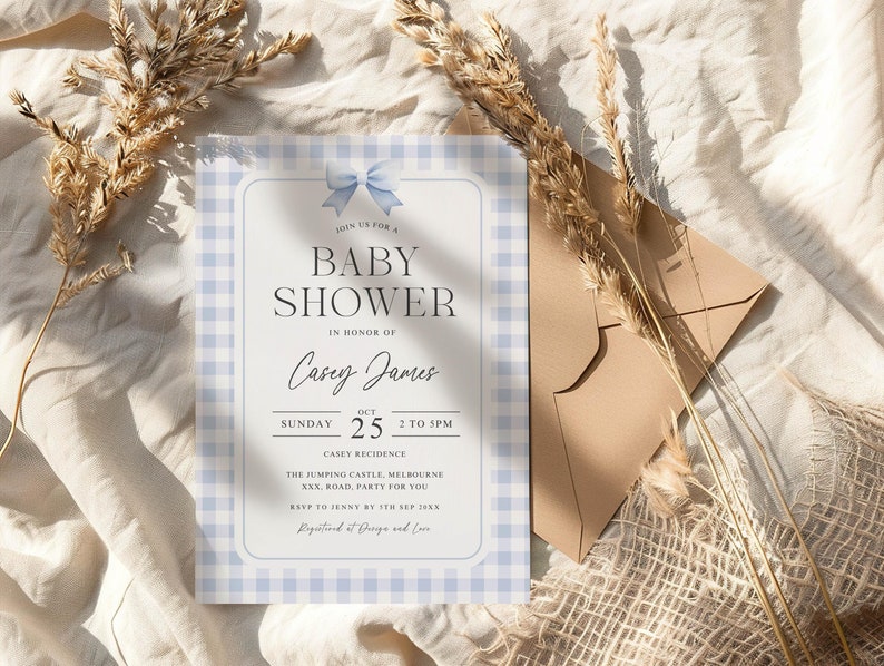 May include: A blue and white gingham baby shower invitation with a blue bow. The invitation reads "Join us for a Baby Shower in honor of Casey James. Sunday, October 25, 2 to 5 PM. Casey Residence. The Jumping Castle, Melbourne XXX, Road, Party for you. RSVP to Jenny by 17th Sep 20XX. Registered at Design and Love."