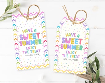 May include: Two gift tags with a colorful design. The tags have a white background with colorful confetti and a border of zigzags. The text on the tags reads "Have a Sweet Summer, Enjoy the Treat, With Love, Taylor."