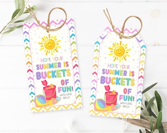 May include: Two summer-themed gift tags with a white background. Each tag features a smiling sun, a pink bucket, a beach ball, and the text "Hope your summer is buckets of fun!" with a rainbow chevron border and a twine loop.