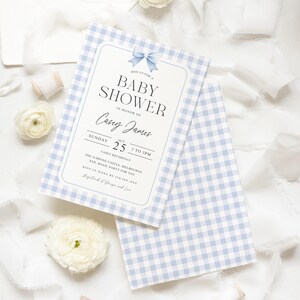 May include: A blue and white gingham baby shower invitation with a blue bow. The invitation reads "Join us for a Baby Shower in honor of Casey James, Sunday, October 25, 2 to 5 pm, Casey Residence, The Jumping Castle, Melbourne, XXX. Road, Party for you, RSVP to Jenny by 17th Sep, JANK, Registered at Dunge and Love."