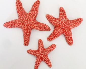 3 Starfish Tiles - reddish orange