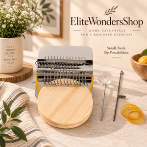 May include: A metal darning loom tool with a circular wooden base, featuring a row of silver hooks and a rectangular frame. The set includes a long metal needle with a clear round handle, a thin metal hook tool, and several small yellow rubber bands.