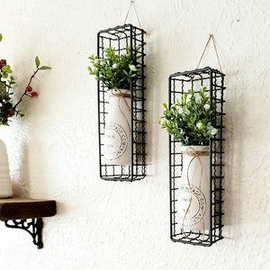 Chic Farmhouse Kitchen Wall Sconces. 2 Hanging White Vintage Milk Bottles Grey Wire Baskets. Greens. Country Cottage Kitchen Decor