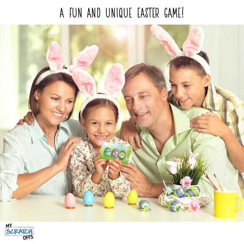 May include: A family of four, including two children, are playing an Easter game. The children are wearing bunny ears headbands. The girl is holding a card with a picture of Easter eggs. There are several colorful Easter eggs on the table in front of them.