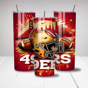 May include: Three red and white stainless steel tumblers with a graphic of a football helmet, football, and the Golden Gate Bridge. The tumblers have the text "49ers" on them.