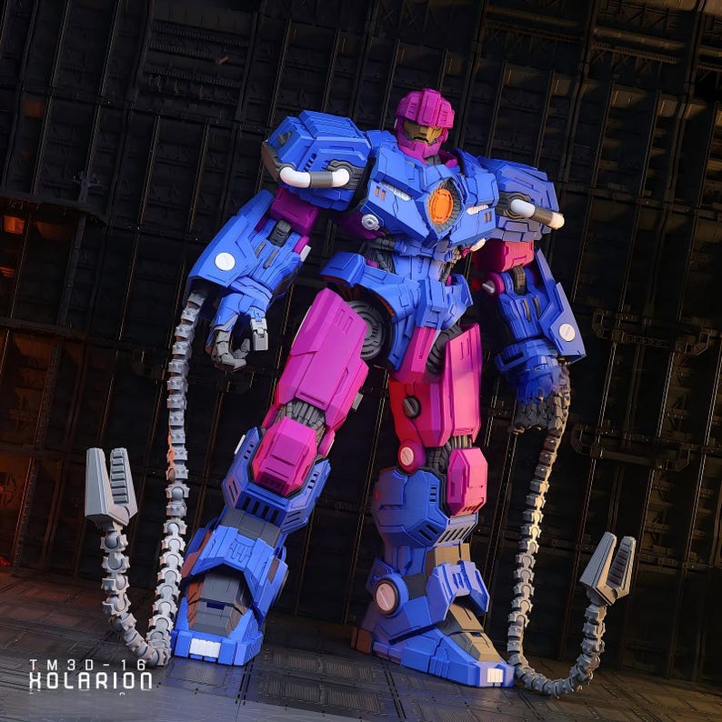 May include: A detailed robot figure in blue and magenta, with visible mechanical detailing. The figure has a circular chest emblem and two articulated appendages. The robot stands on a textured surface. The image includes the text "TM3D-16 KOLARION".