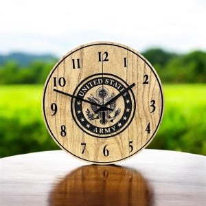 May include: A wooden clock with a black and white United States Army seal in the center. The clock face has black numbers and hands.