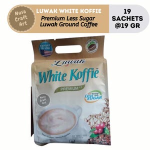May include: A packet of Luwak White Koffie instant coffee with a brown and gold background. The packet features a cup of coffee, coffee beans, and the text "Luwak White Koffie" in a blue and white font. The packet also includes the text "Premium Less Sugar" and "Export to USA".