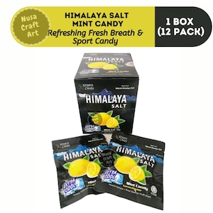 May include: Himalaya Salt Mint Candy packaging. The image shows a black box and individual packets with lemon illustrations. Text on the packaging includes "Refreshing Fresh Breath & Sport Candy" and "Extra Cool".