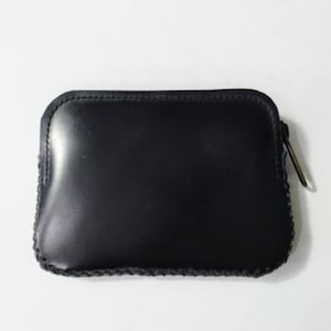 Cartera de piel auténtica Esta cartera está hecha a mano por un artesano. El bolsillo es lo suficientemente grande para guardar monedas y tarjetas. Cuero impermeable.