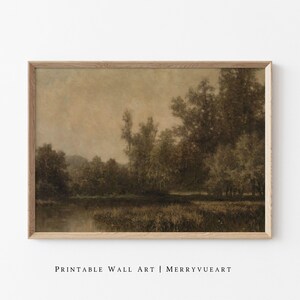 May include: A framed sepia-toned landscape painting featuring a tranquil scene of trees and a body of water. The artwork has a vintage aesthetic, with the text "PRINTABLE WALL ART | MERRYVUEART" at the bottom.