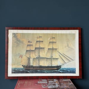Old framed print of a historic sailing ship