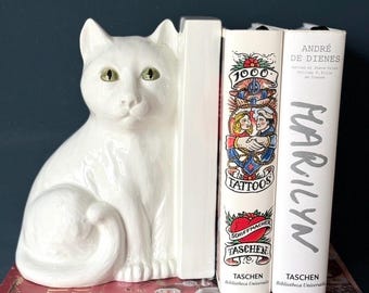 Sujetalibros antiguo con un gato de preciosos ojitos