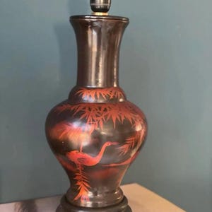 Chinese crane and bamboo lamp base. Dark brown with rust/copper color.