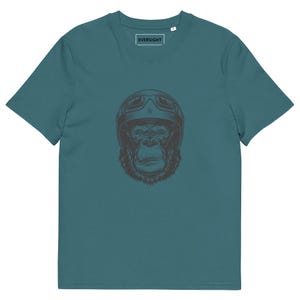 May include: Teal blue t-shirt with a black and white illustration of a gorilla wearing a motorcycle helmet. The text "EVERSIGHT" is printed on the shirt.
