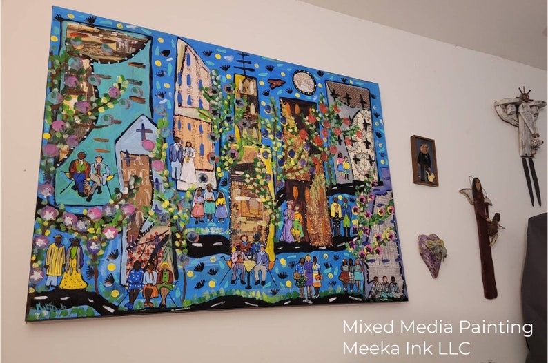May include: A colorful mixed media painting depicting a town scene with houses, trees, and people. The painting is done in a vibrant style with a blue background and features a variety of textures and materials.