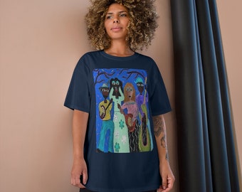 May include: A navy blue t-shirt with a colorful illustration of four people playing music. The illustration features a blue, green, and purple color scheme.