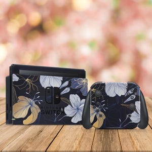 Lelietje-van-dalen Nintendo Switch-skin – vinylsticker met volledige omslag voor een elegante en natuurlijke look | Handgemaakte consolewrap met bloemkunst
